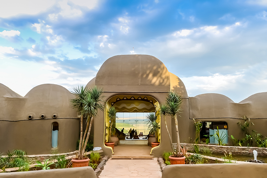 The entrance to mara serena with a spacious courtyard.
