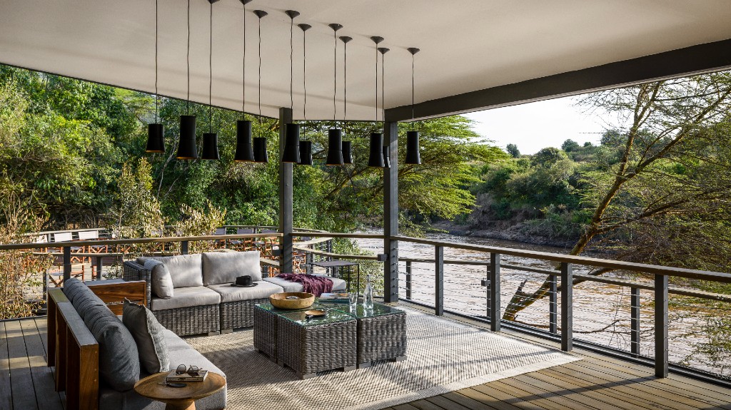Outdoor living area at safari lodge, Sanctuary Olonana.