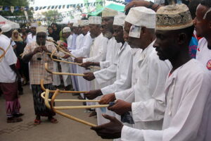 NAIROBI, KENYA NOVEMBER 24: (SOUTH AFRICA OUT) Mdurwenge dancers play their drums during the donkey race competition at the 13th annual Lamu Cultural Festival on November 24, 2013 in Nairobi, Kenya. The festival is a celebration of the unique Swahili heritage. (Photo by Laban Walloga/Nation Media/Gallo Images/Getty Images)