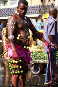 Quatre Borne, Mauritius - May 5, 2023: The main festival of the Temple Siva Subramanya Kovil, Velamurugan Kalyana Mandapam (Kovil Montagne) is the Sittrai Cavadee on the Chitra Pownami day. It is the first temple to have celebrated this festival in Mauritius and as such is known ‘Kavadi Montagne’ around the island. The temple is dedicated to lord Murugan (Hindu god of war). Some penitent choose to pierce the body of needles on different parts of the body. Some people pierce their mouth or their tongue with a long and big needle.