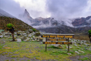 Sign post on Naro Moru hiking trail to the top of Mount Kenya
