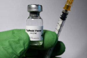 Typhoid fever vaccine - administration of antigenic material (vaccine) to stimulate an individual's immune system to develop adaptive immunity to a pathogen. ideal vaccine for safari