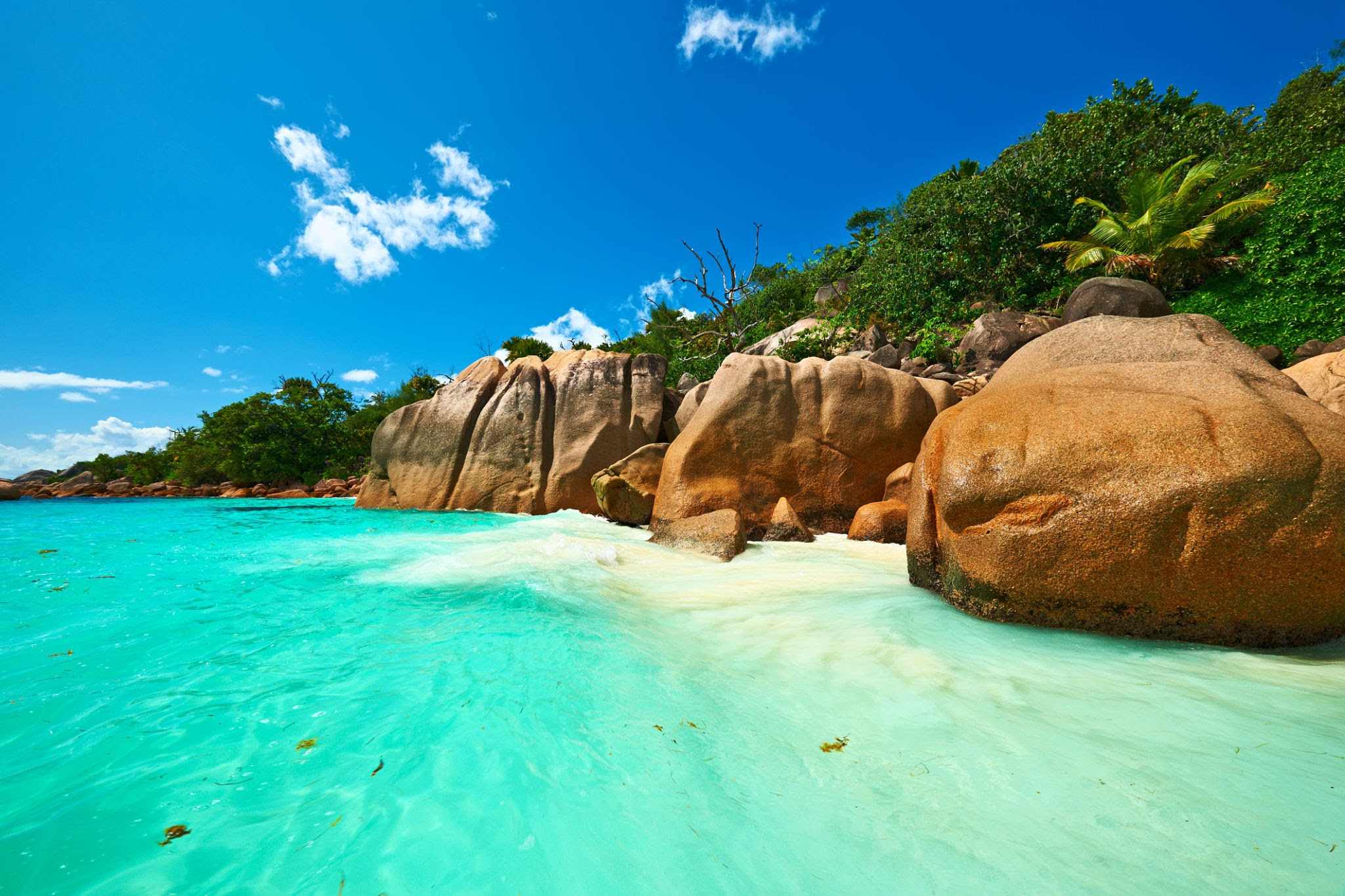 Captivating Anse Lazio beach in Seychelles, featuring pristine white sand and inviting azure waters.