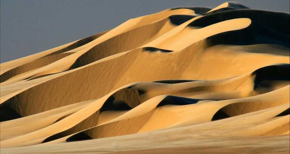Sand dunes of the Sahara Desert in The Great Sand Sea, Egypt.