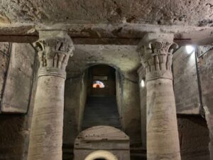 The catacombs of Kom El Shoqafa meaning `Mound of Shards` is a historical archaeological site located in Alexandria, Egypt, and is considered one of the Seven Wonders of the Middle Ages