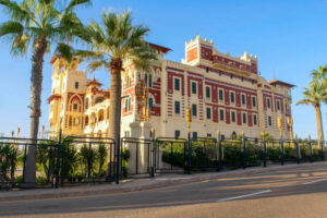 Alexandria - Egypt - October 08, 2020: Beautiful view of Montaza Palace exterior in Montazah public park. Royal Gardens and palace in Egypt before the sunset.