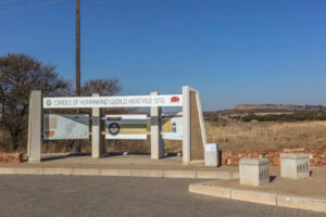 Display sign of the Cradle of Humankind explaining the origins of the archeological findings at Sterkfontein caves where an estimated 40% of all the world's human ancestor fossils have been found.